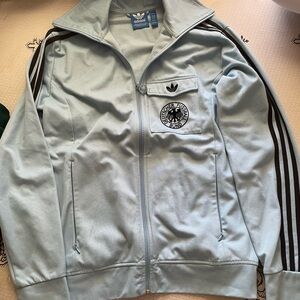 Adidas Sky Blue Track Jacket with Black Stripes